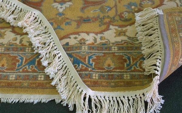 Worn and tattered fringes can have new artificial fringes hand sewn over the existing fringes