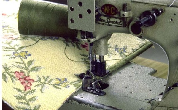 Is another way to finish the ends and sides of machine made carpets by applying a beautiful continuous wool wrapping that is available in numerous colors.